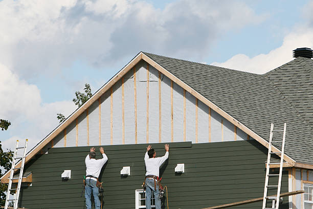 Professional Emergency Siding Repair technician working in Westlake, OH